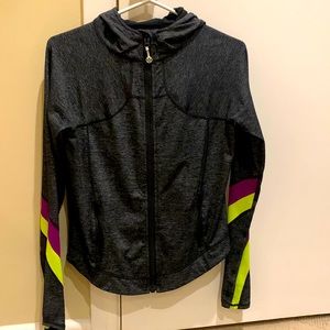 Lululemon grey work out jacket, size 10 size sticker still in the pocket.